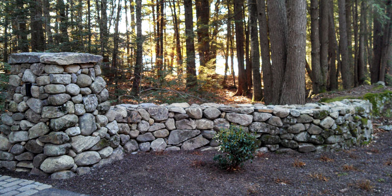 Rustic stone wall in forest